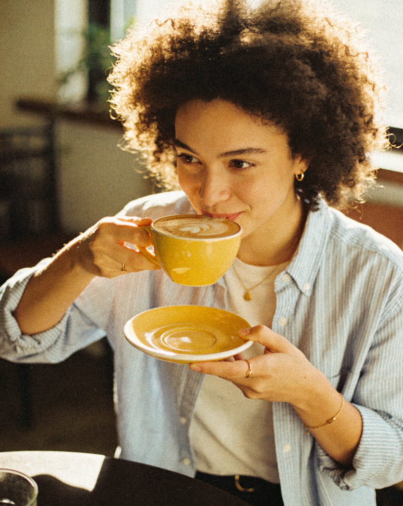 Lady-sipping-coffee-manchester_1200x1000